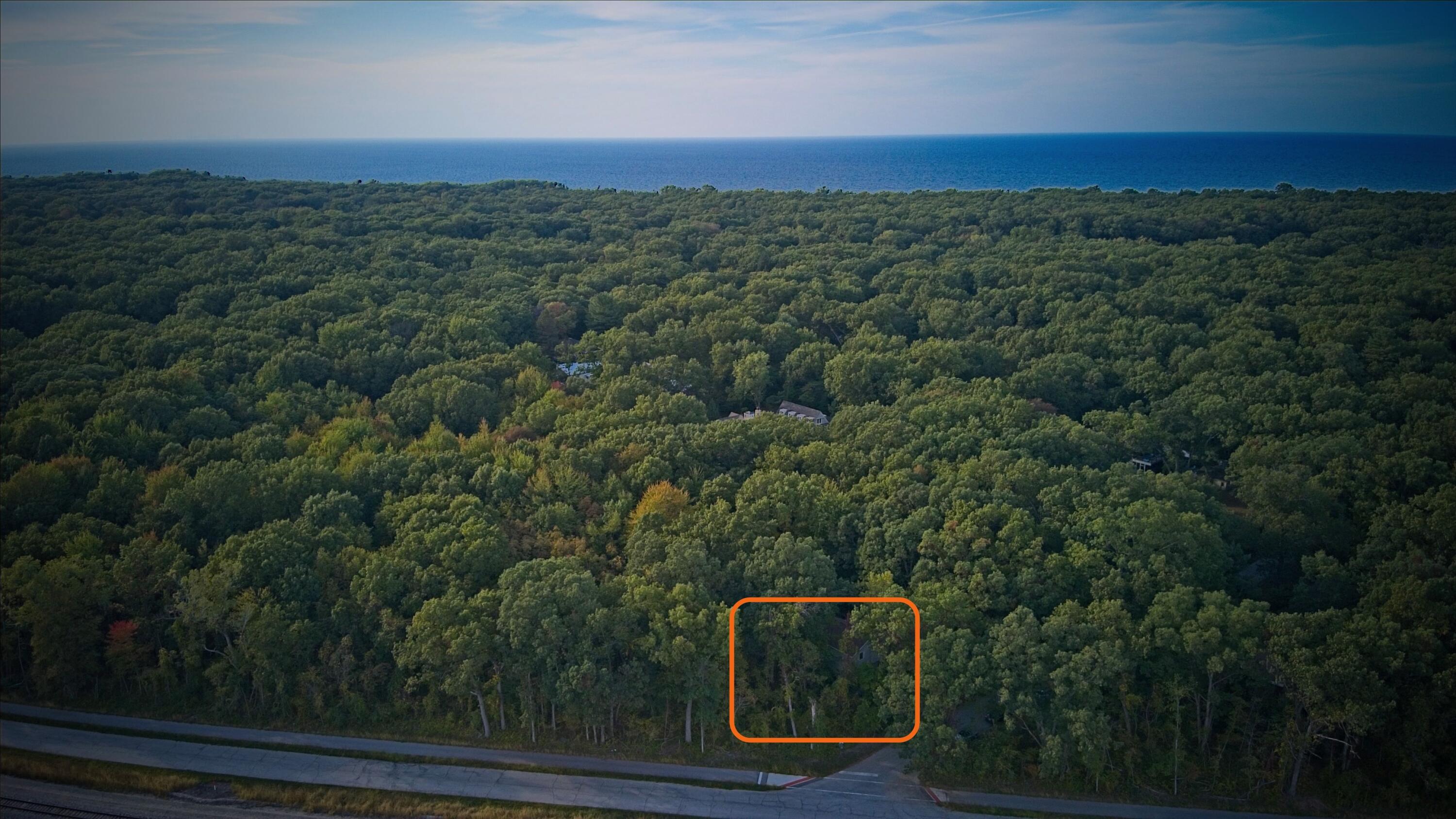 218 Chickadee Trail Michigan City, IN 46360 - Photo 3 of 40 an aerial view of a house with a yard and lake view