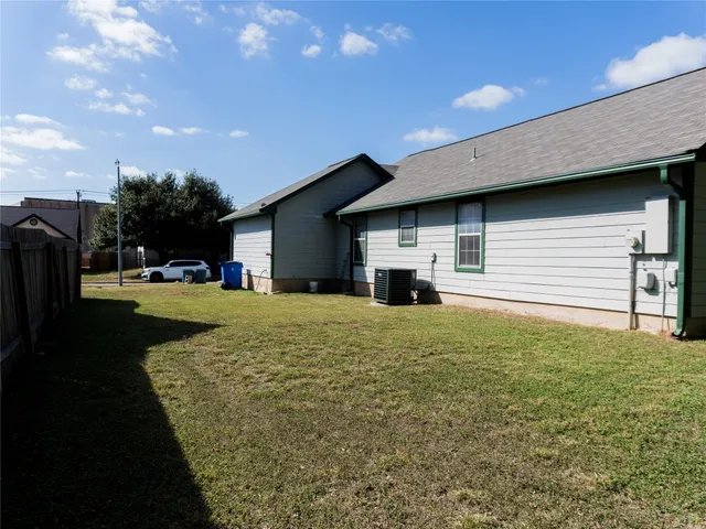 a house view with a garden space