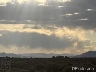 a view of a city with sunset view