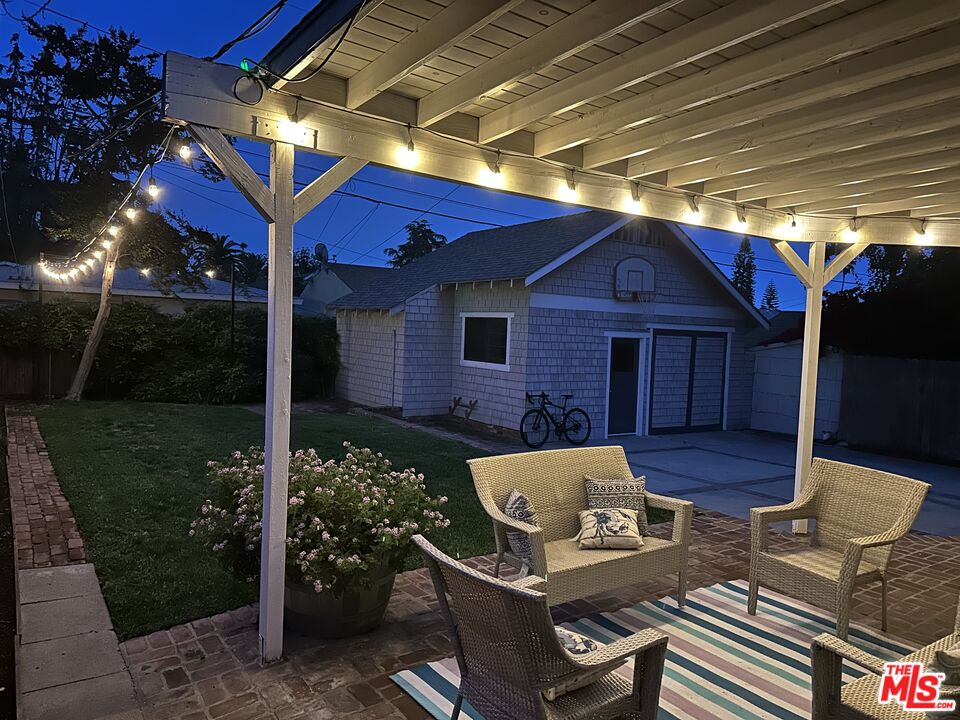 1266 Wesley Avenue Pasadena, CA 91104 - Photo 25 of 25 a view of a chairs and table in the patio