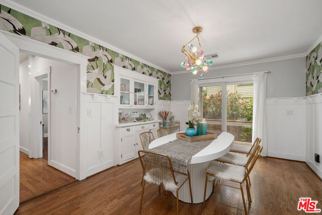 1266 Wesley Avenue Pasadena, CA 91104 - Photo 7 of 25 a view of a dining room with furniture window and wooden floor