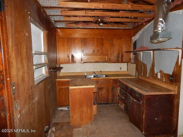 a utility room with washer and dryer