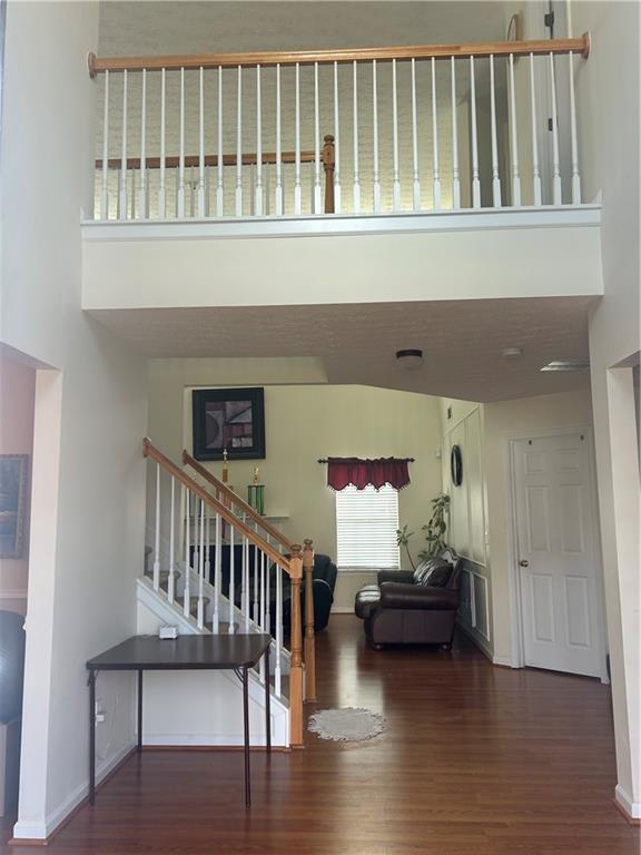 769 Roxholly Lane Northeast Buford, GA 30518 - Photo 15 of 81 a view of livingroom with furniture and wooden floor
