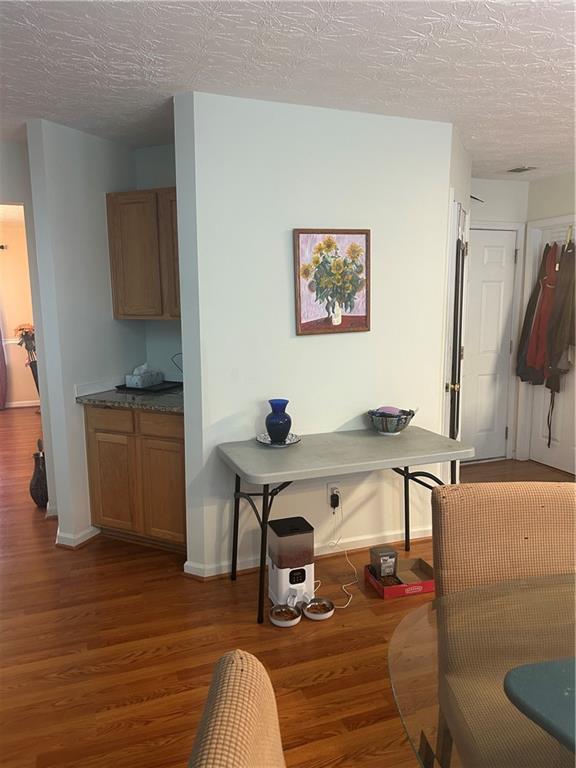 769 Roxholly Lane Northeast Buford, GA 30518 - Photo 32 of 81 a view of a workspace with furniture and a window