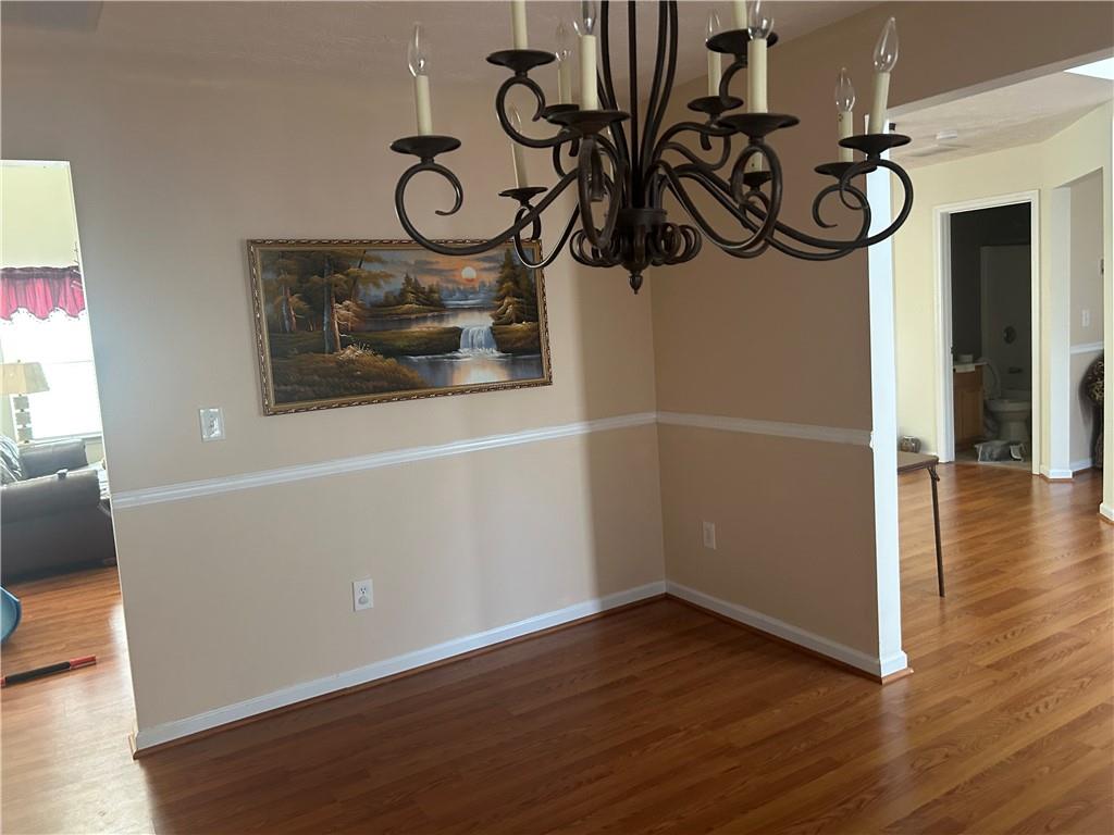 769 Roxholly Lane Northeast Buford, GA 30518 - Photo 38 of 81 a view of an entryway with wooden floor
