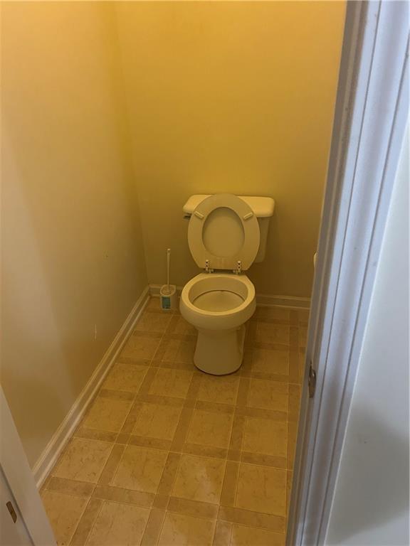 769 Roxholly Lane Northeast Buford, GA 30518 - Photo 55 of 81 a bathroom with a toilet and a sink
