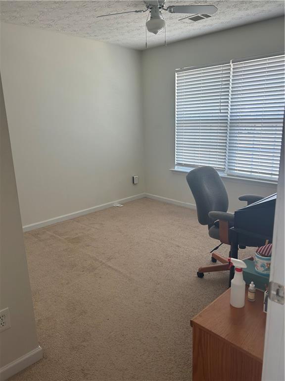 769 Roxholly Lane Northeast Buford, GA 30518 - Photo 70 of 81 a view of a workspace with a window
