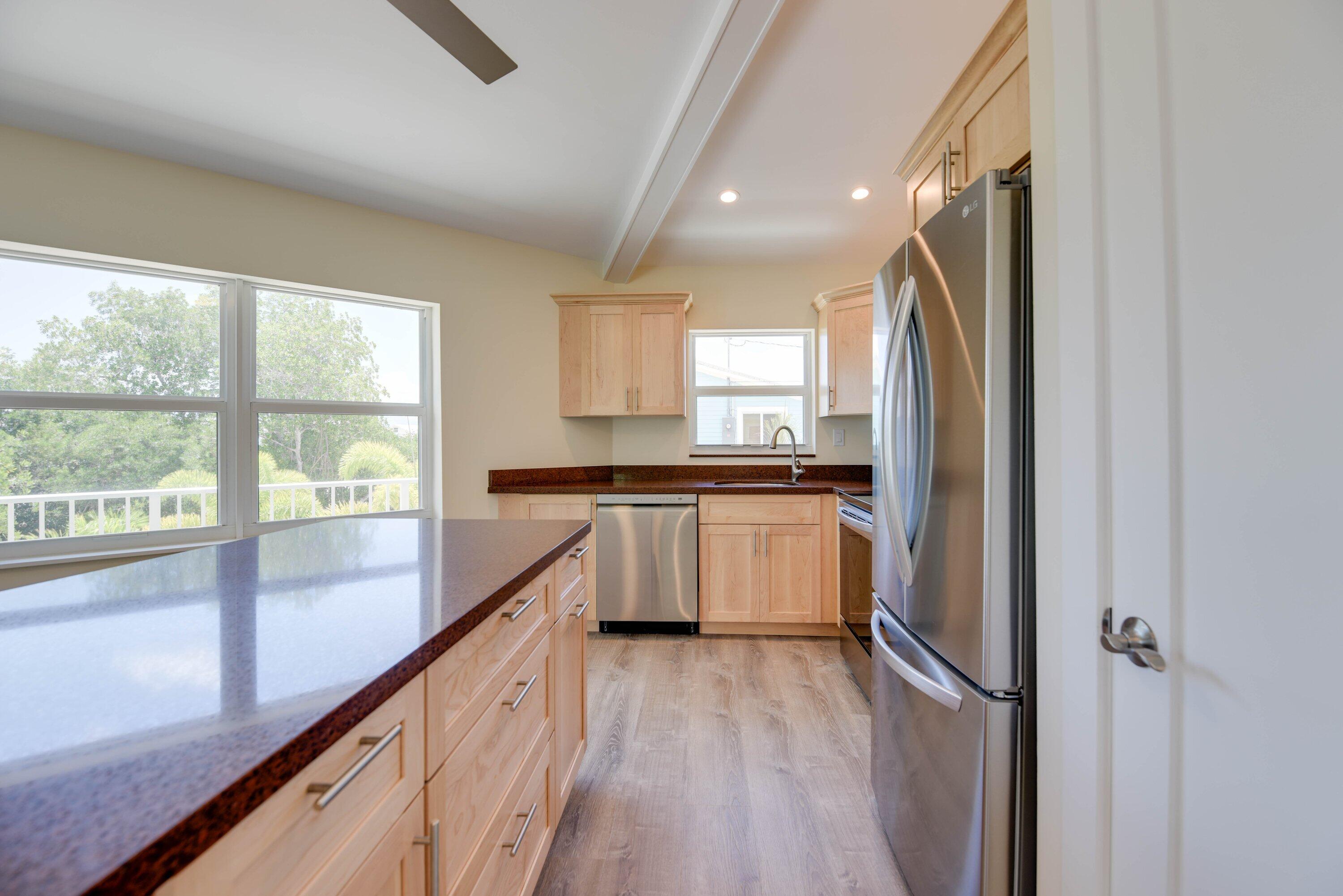 273 Indies Road Summerland Key, FL 33042 - Photo 5 of 37 Granite and stainless kitchen