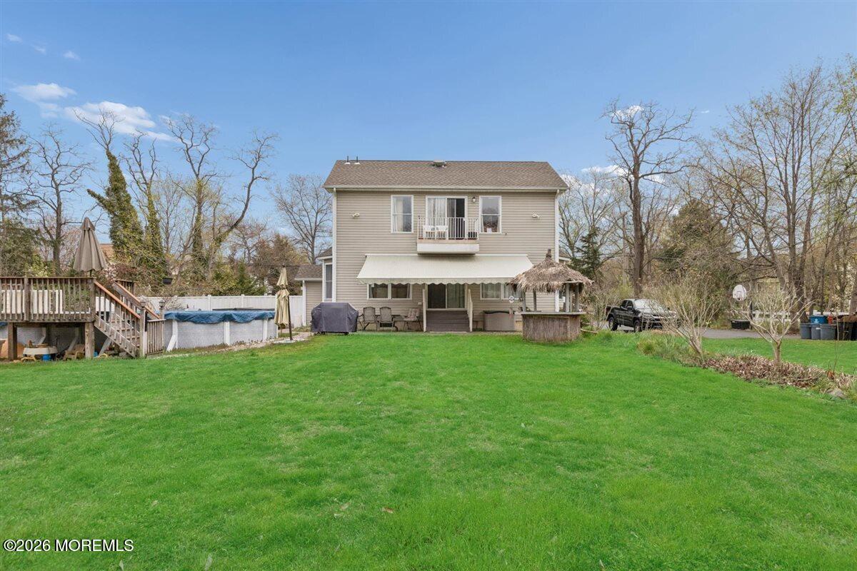 436 Cook Road Jackson, NJ 08527 - Photo 39 of 44 a view of a house with a big yard and large trees