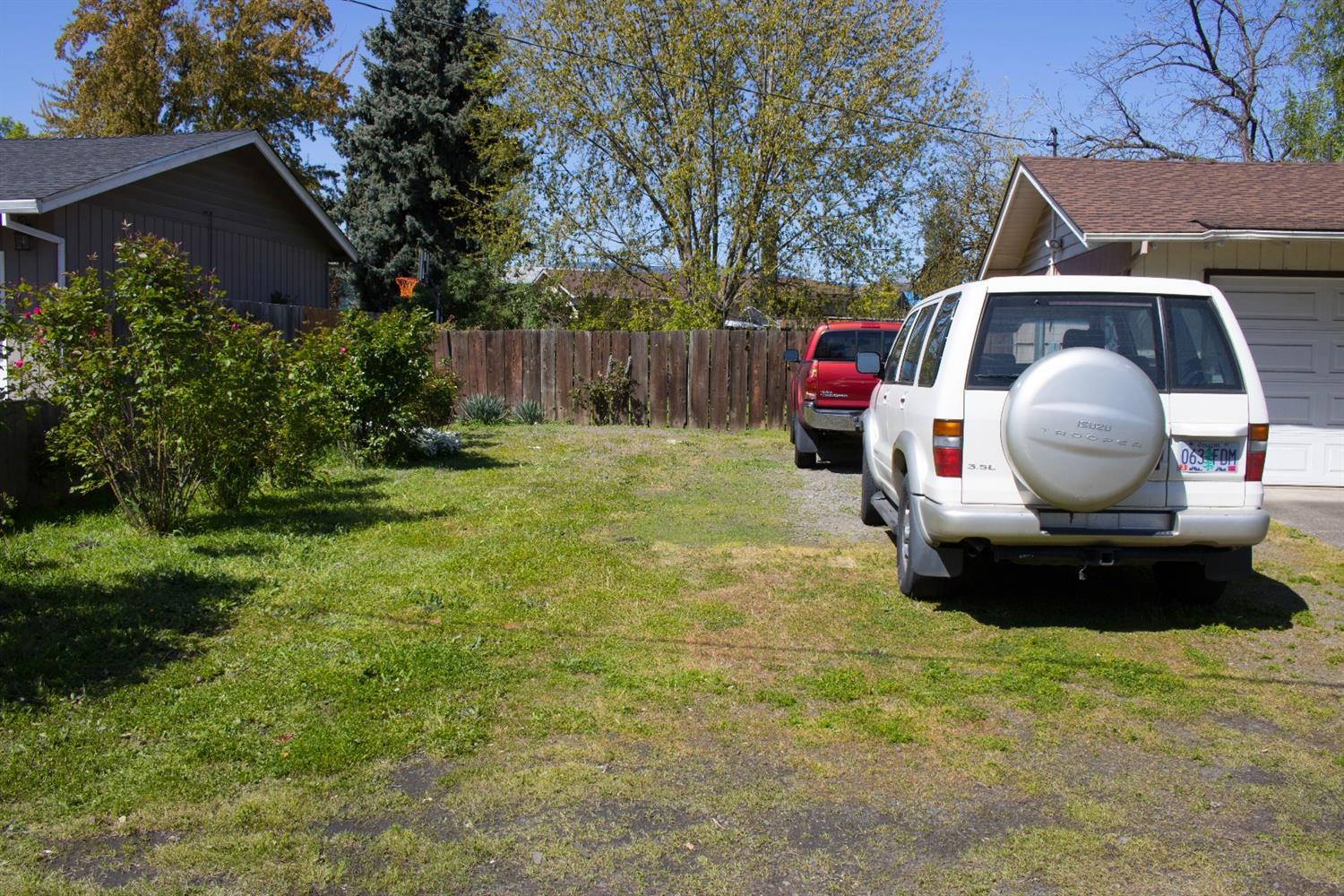 2613 Table Rock Road Medford, OR 97501 - Photo 20 of 23 a backyard of a house with table and chairs