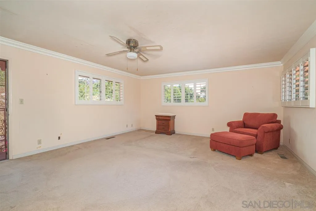1307 Van Vechten Road El Cajon, CA 92019 - Photo 22 of 24 a living room with furniture and a window