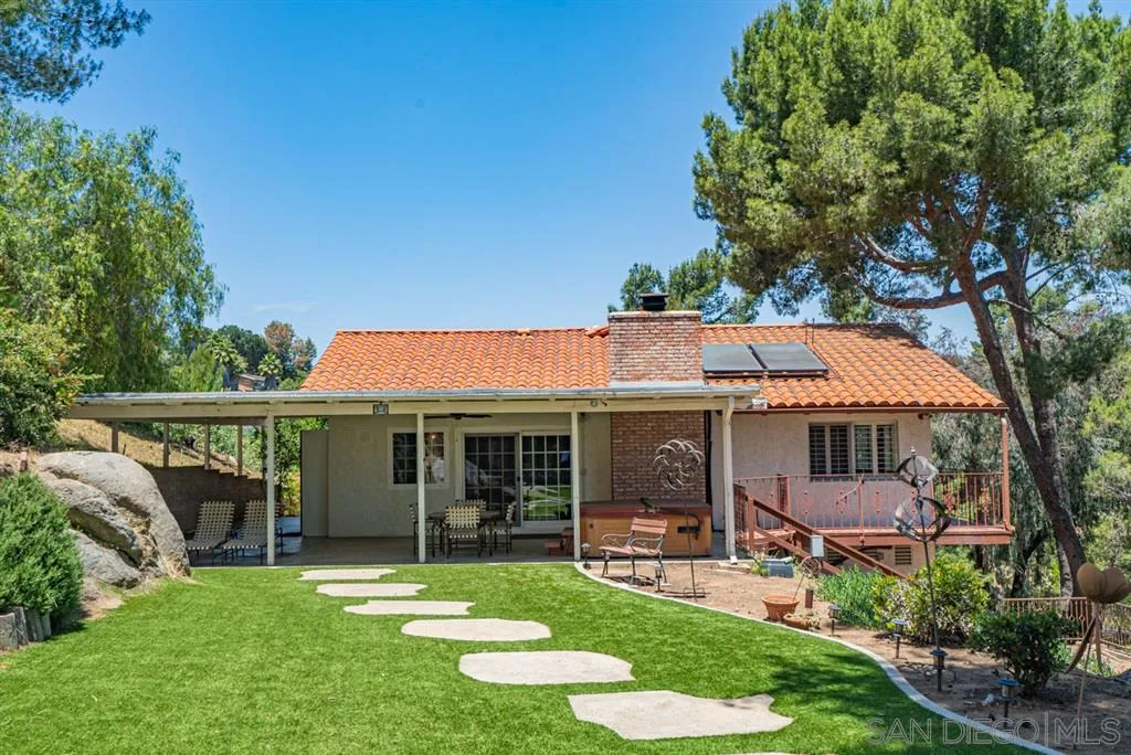1307 Van Vechten Road El Cajon, CA 92019 - Photo 4 of 24 a view of a house with a yard porch and sitting area