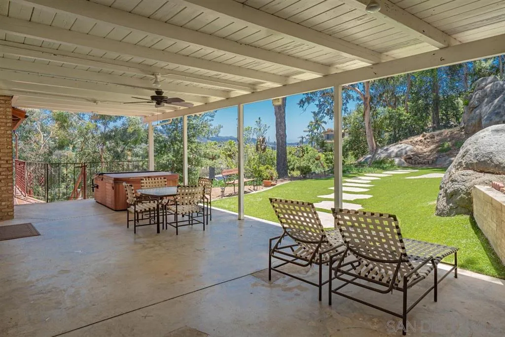 1307 Van Vechten Road El Cajon, CA 92019 - Photo 6 of 24 a view of a patio with a table chairs and backyard