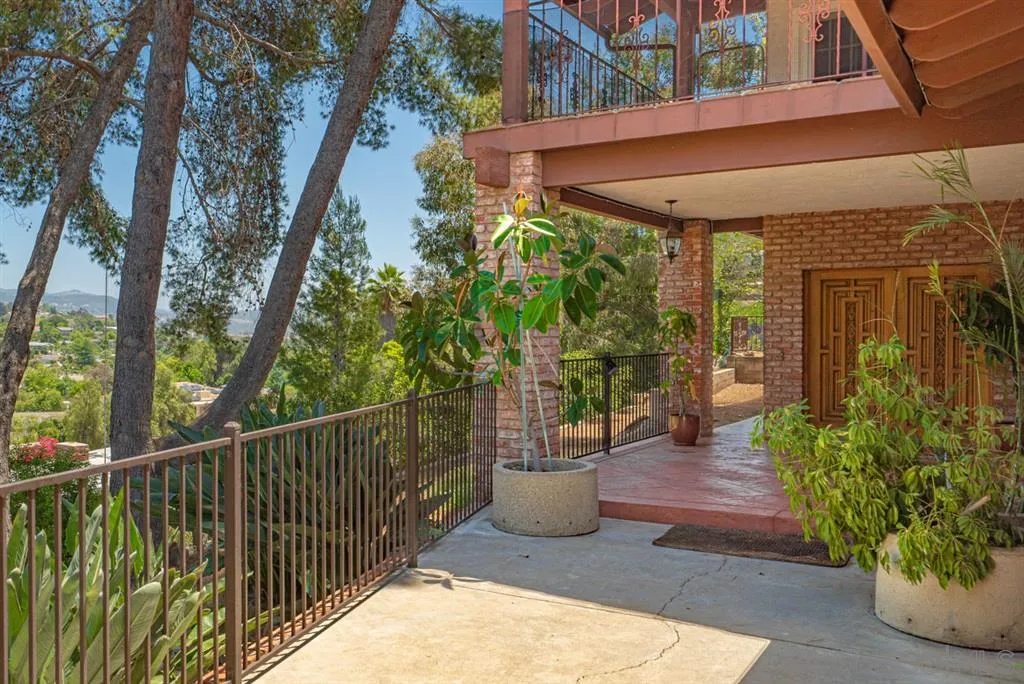 1307 Van Vechten Road El Cajon, CA 92019 - Photo 9 of 24 a view of a patio with table and chairs and potted plants