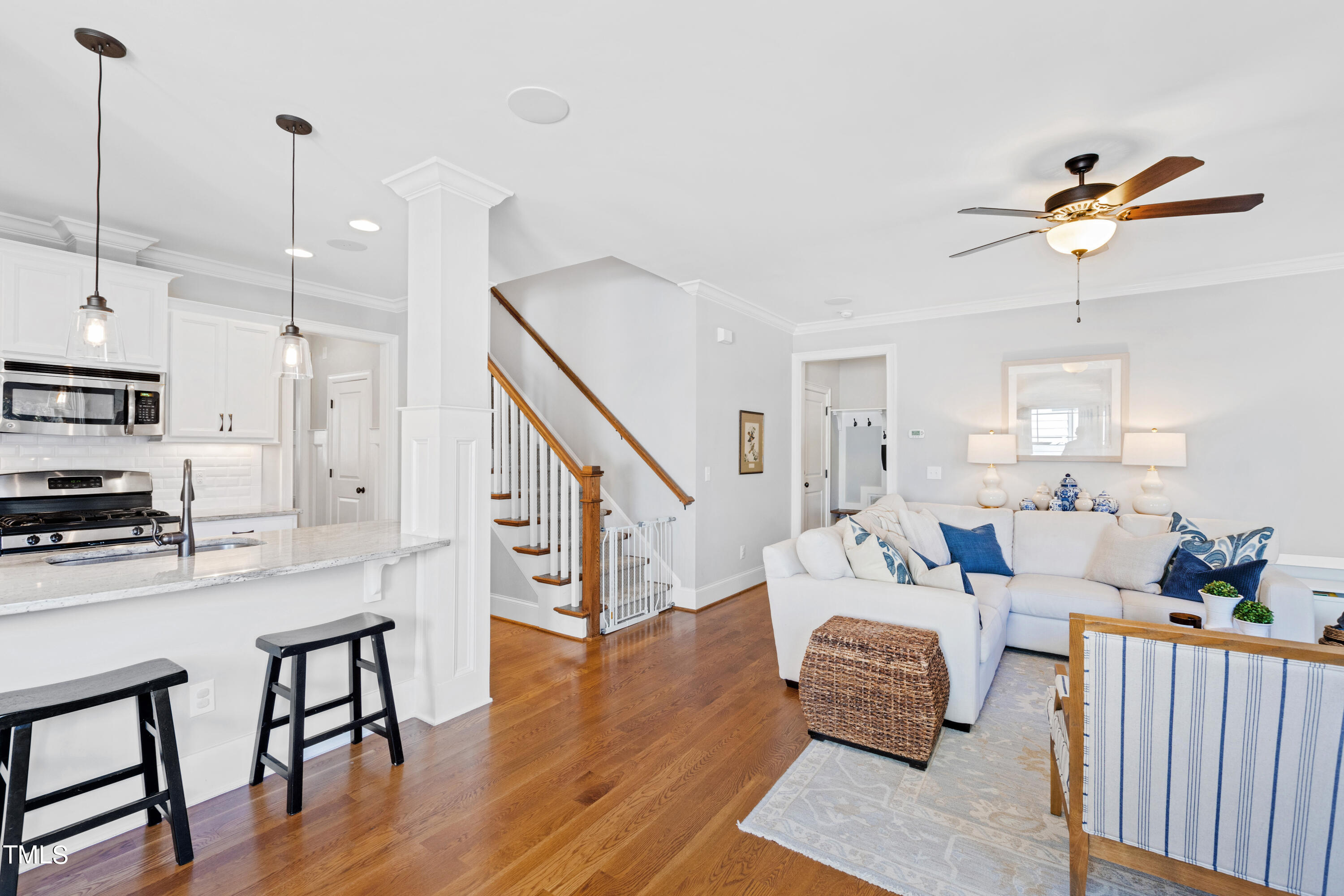6213 Blanche Drive Raleigh, NC 27607 - Photo 14 of 48 a living room with furniture and a wooden floor