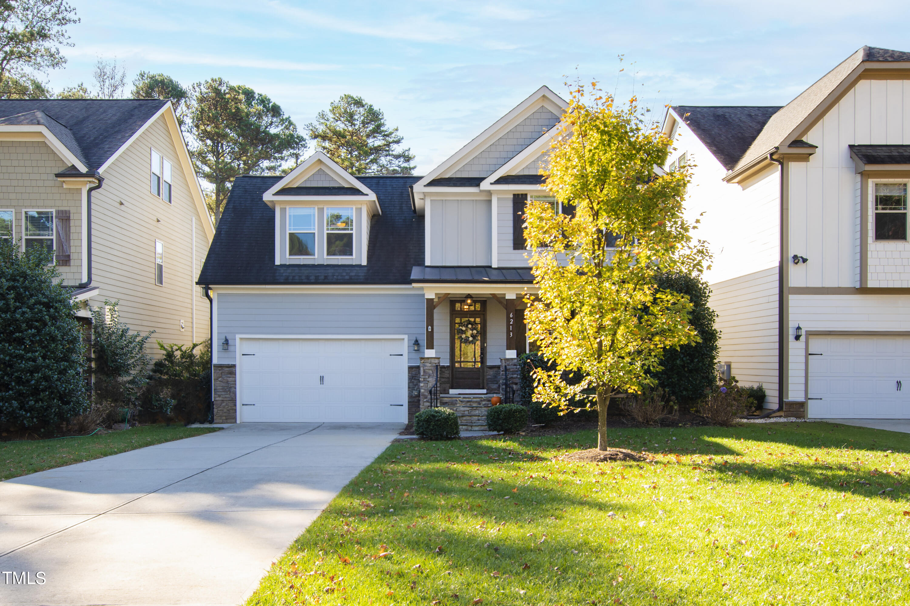 6213 Blanche Drive Raleigh, NC 27607 - Photo 2 of 48 a front view of a house with a yard