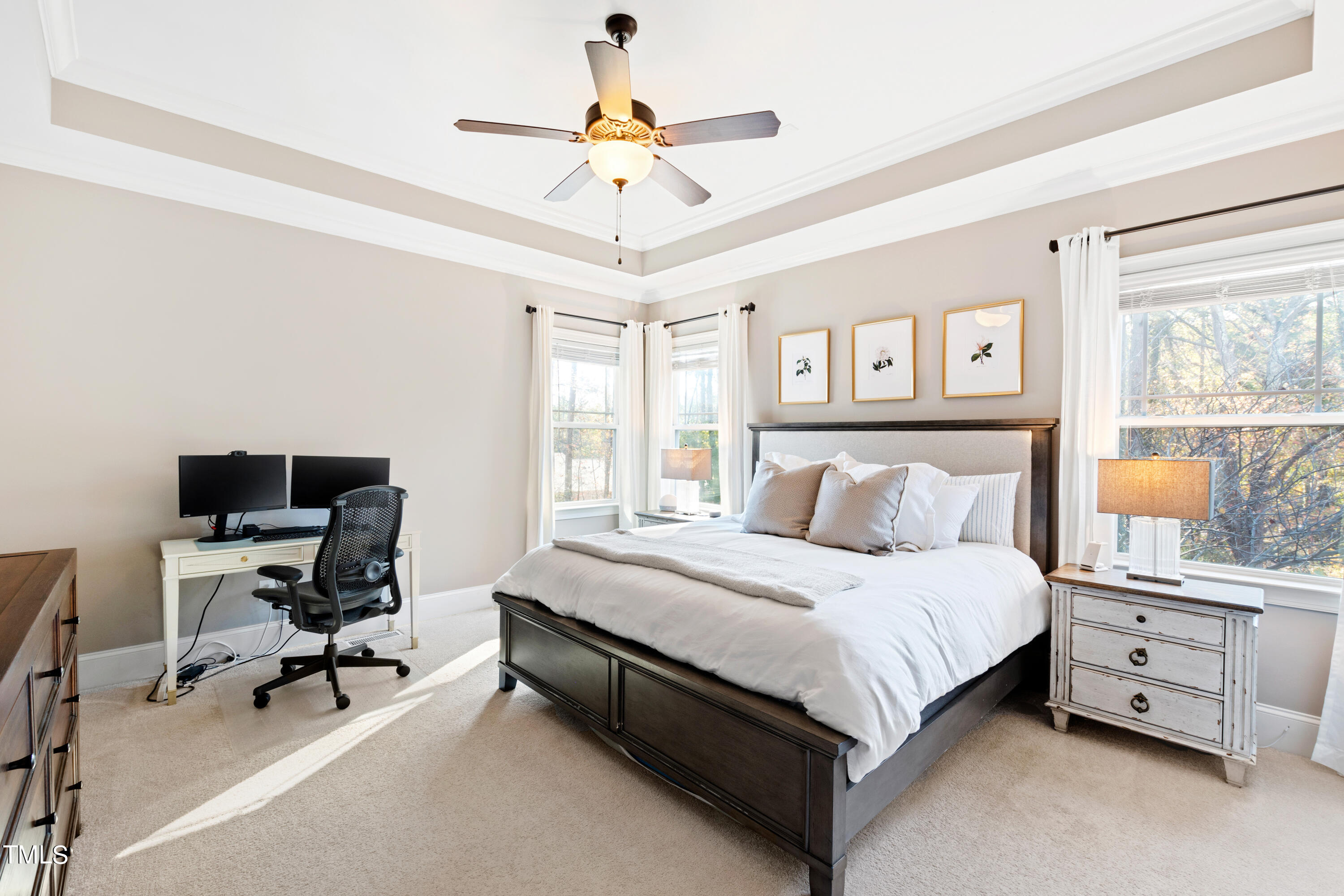 6213 Blanche Drive Raleigh, NC 27607 - Photo 21 of 48 a bedroom with a bed a desk and chair