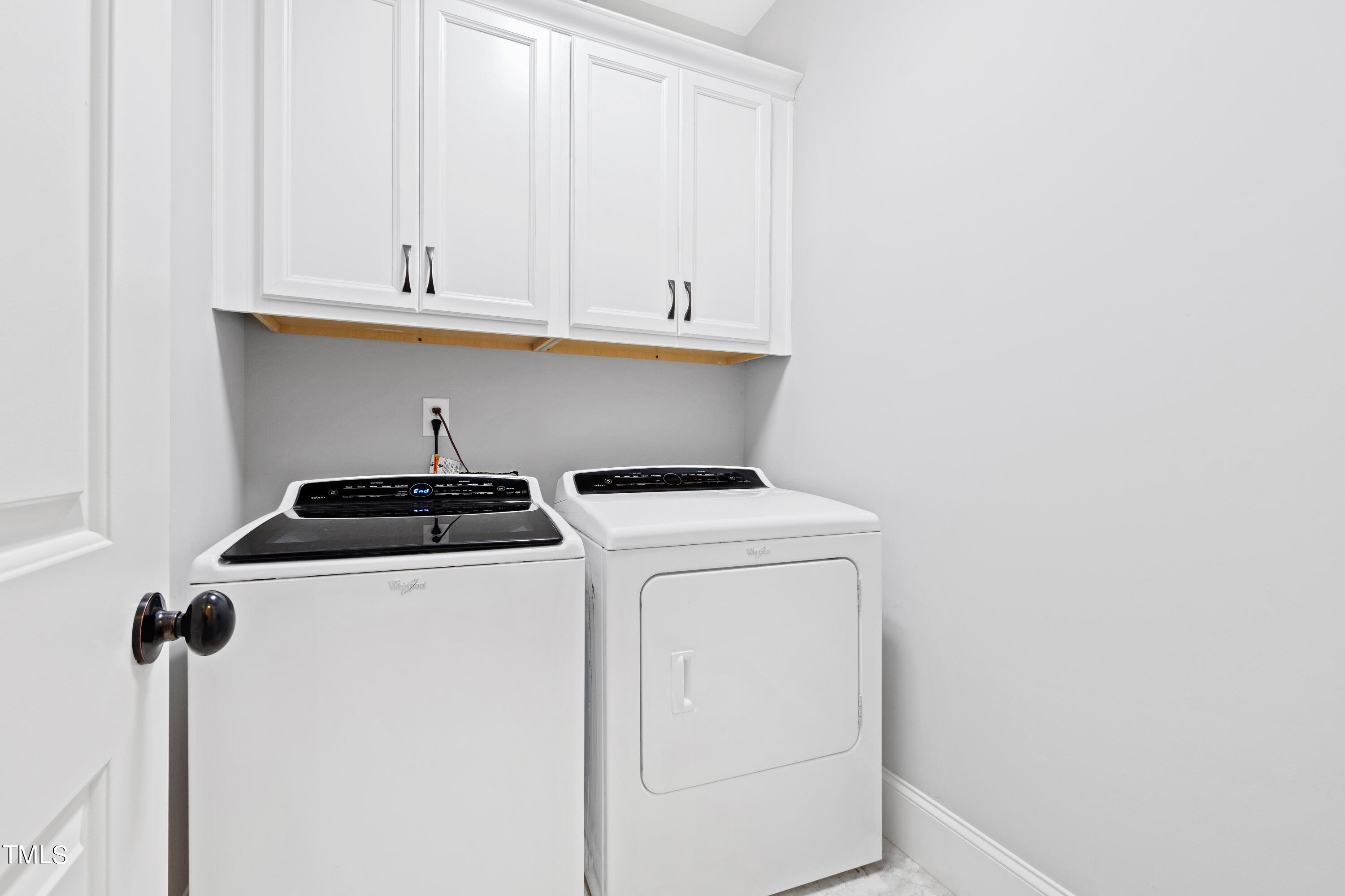 6213 Blanche Drive Raleigh, NC 27607 - Photo 29 of 48 a utility room with dryer and washer