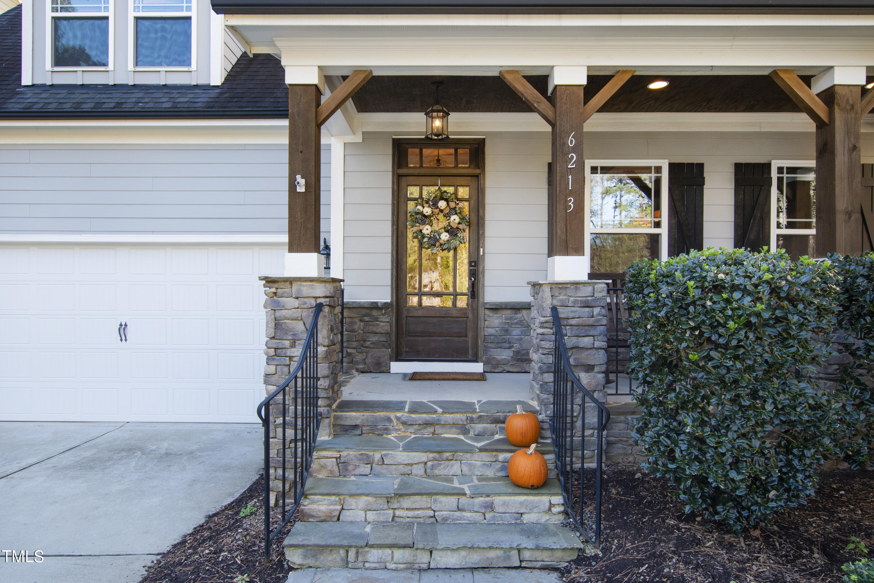 6213 Blanche Drive Raleigh, NC 27607 - Photo 3 of 48 a front view of a house with outdoor seating