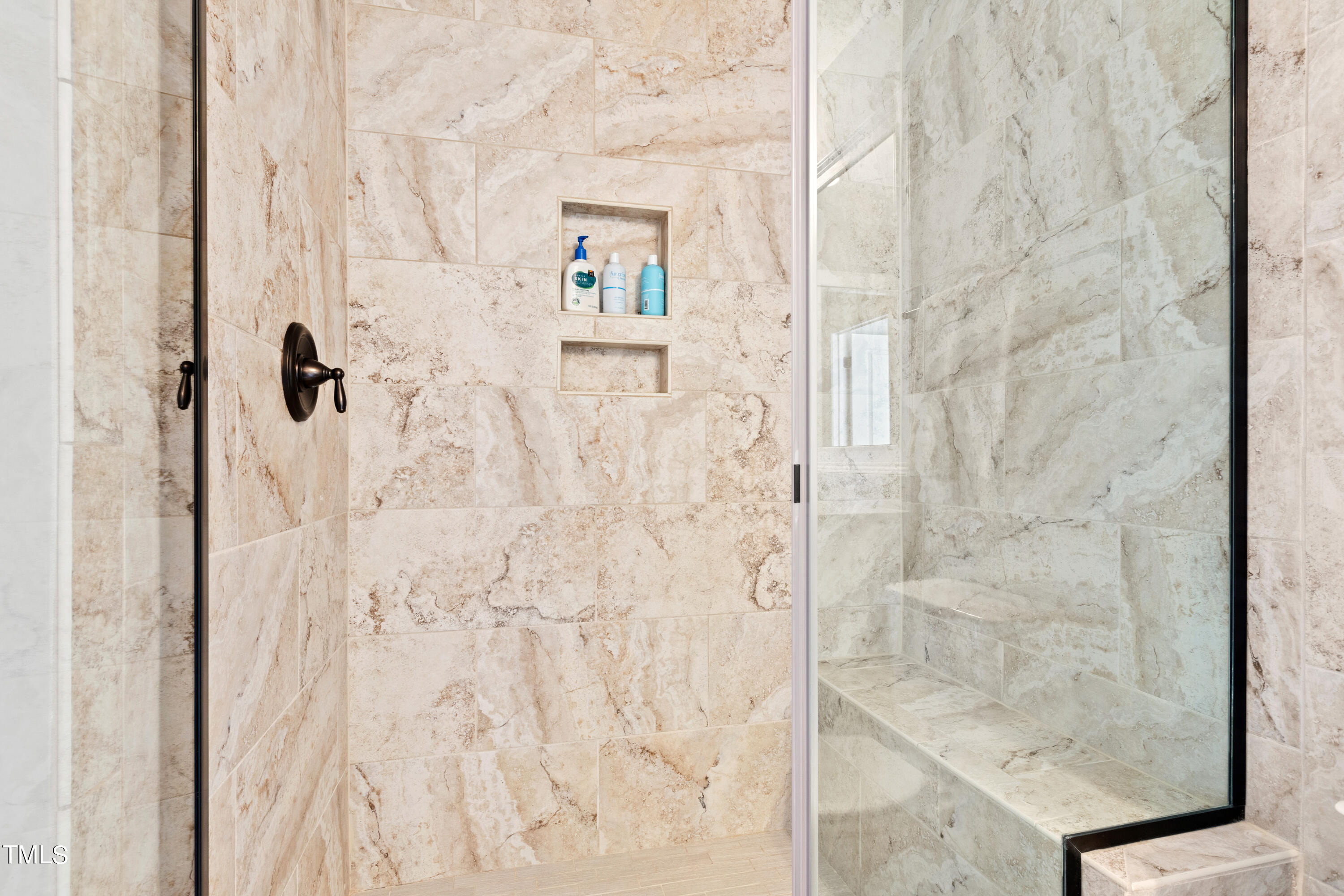 6213 Blanche Drive Raleigh, NC 27607 - Photo 36 of 48 a bathroom with a shower