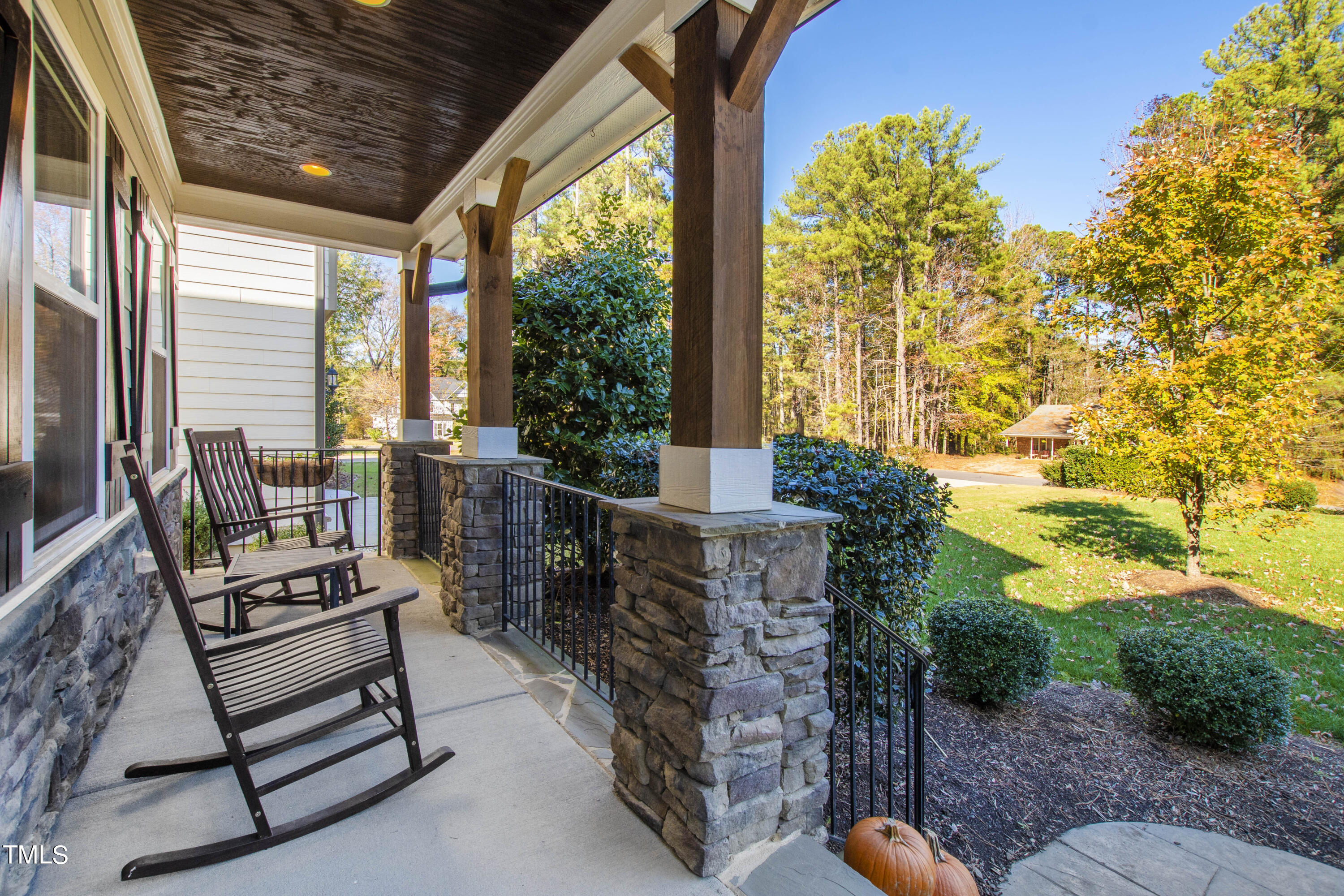 6213 Blanche Drive Raleigh, NC 27607 - Photo 4 of 48 a balcony with furniture and garden view