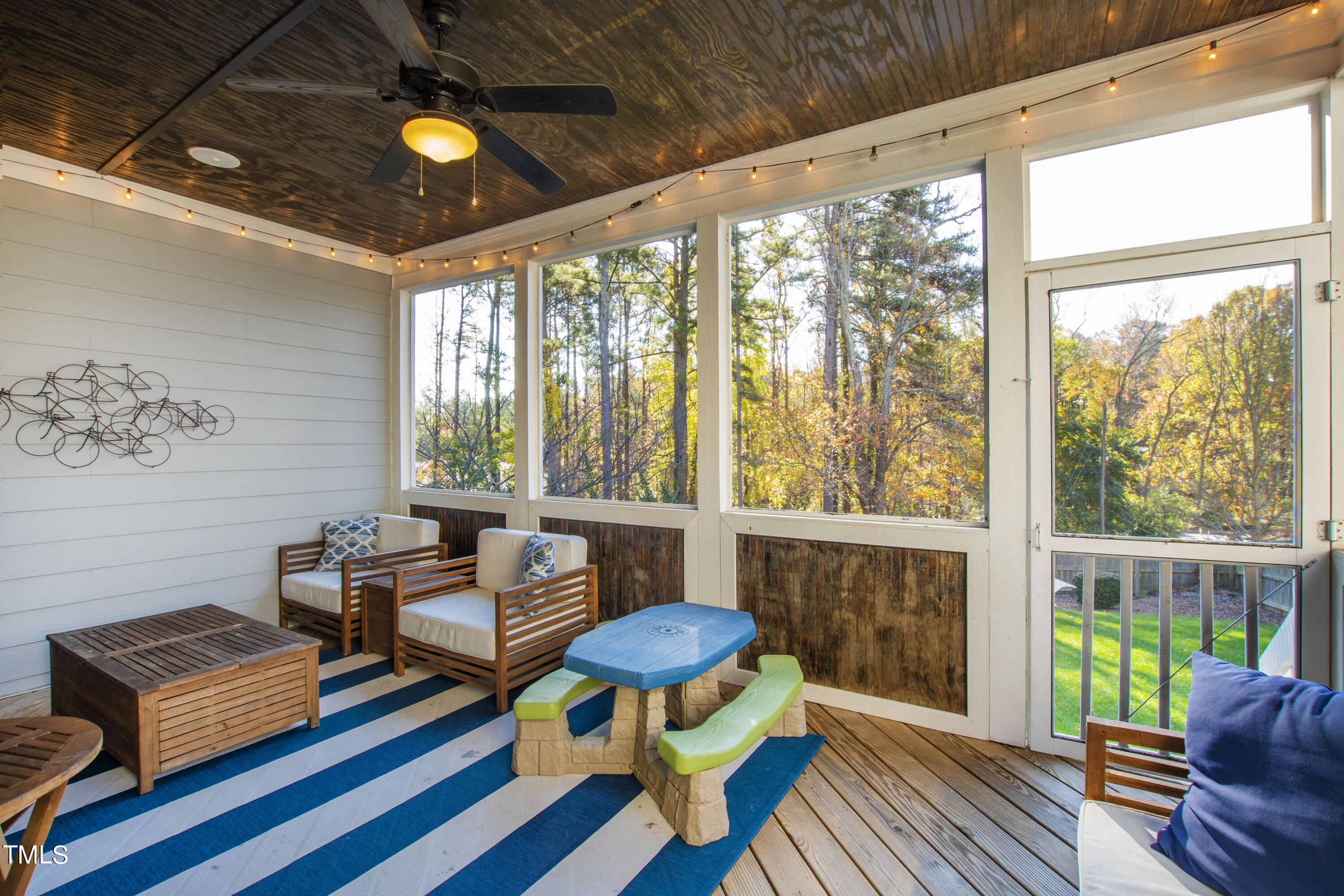 6213 Blanche Drive Raleigh, NC 27607 - Photo 44 of 48 a living room with furniture and a large window