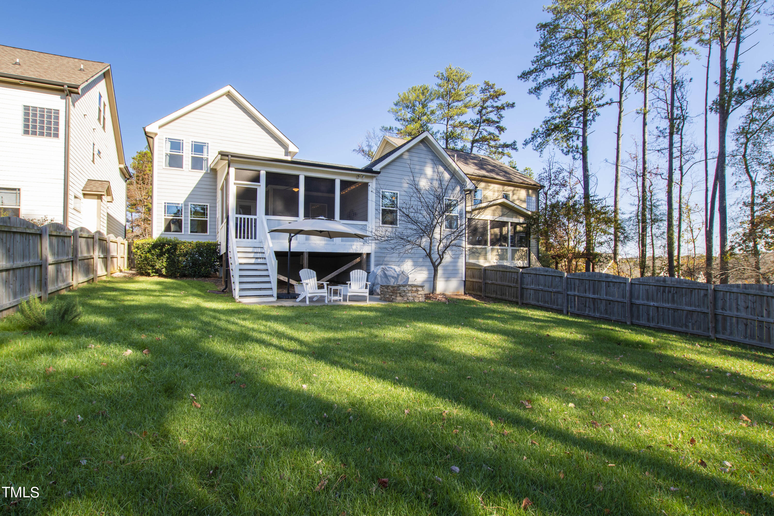 6213 Blanche Drive Raleigh, NC 27607 - Photo 45 of 48 a front view of house with yard and outdoor seating