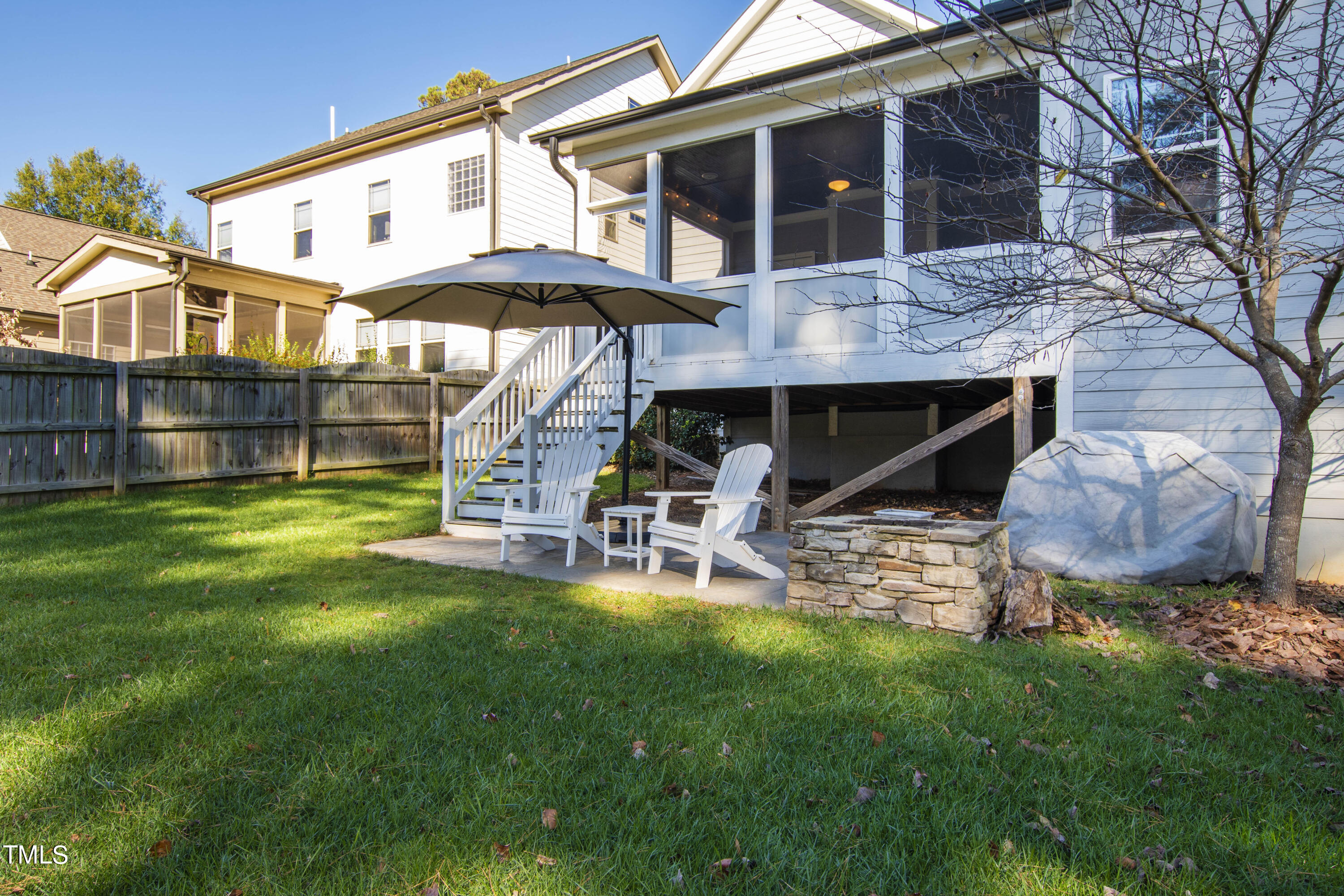 6213 Blanche Drive Raleigh, NC 27607 - Photo 46 of 48 a view of a house with a yard and sitting area