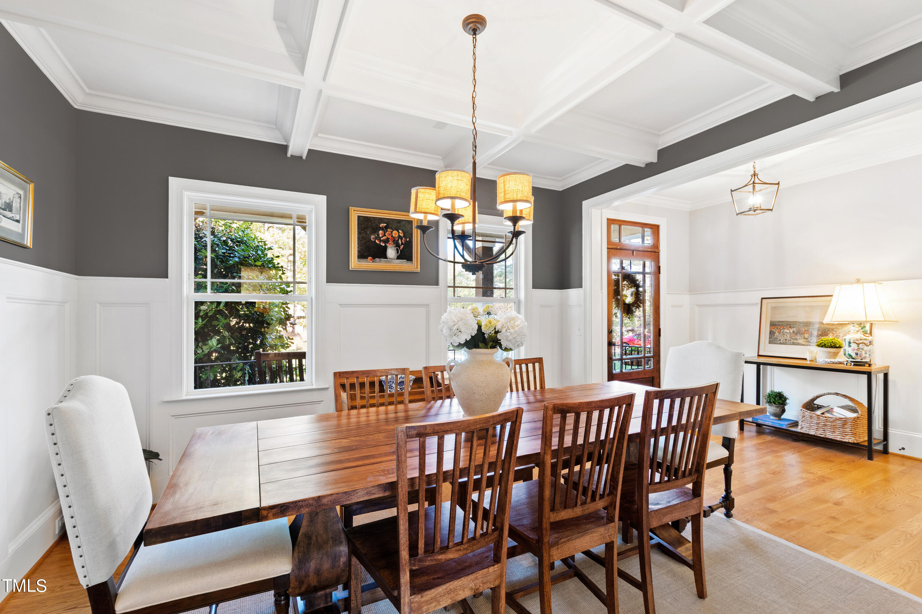 6213 Blanche Drive Raleigh, NC 27607 - Photo 6 of 48 a dining room with furniture window wooden floor