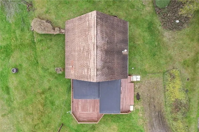 a brick building with a yard