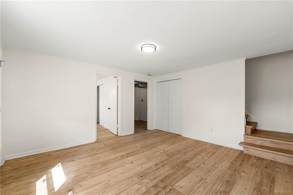3981 Rutgers Drive Southwest Atlanta, GA 30331 - Photo 11 of 13 a view of empty room with wooden floor
