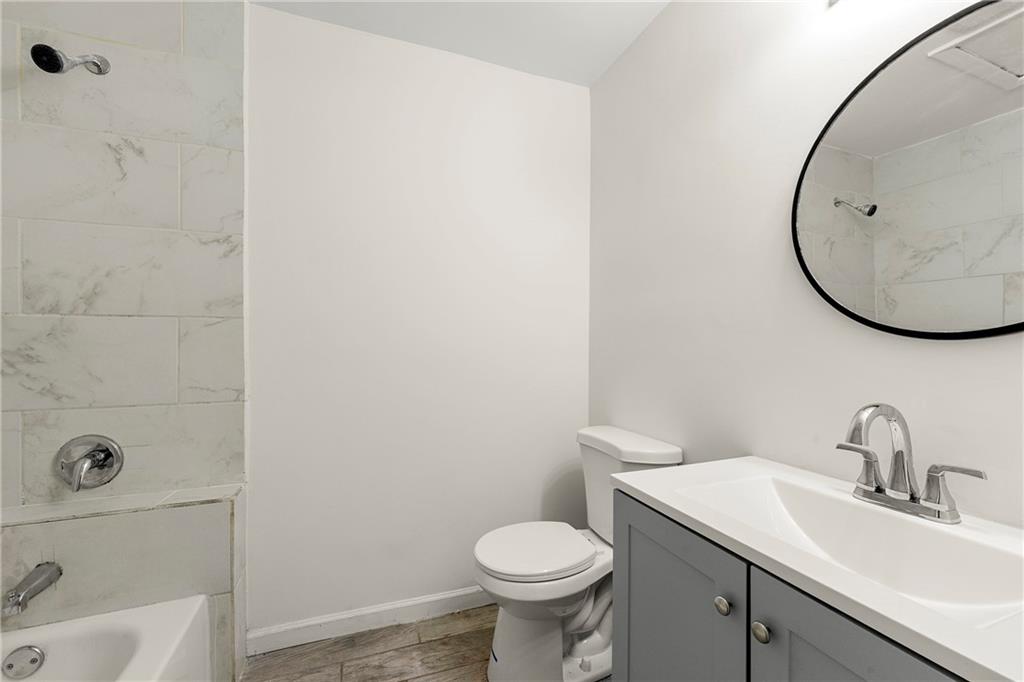 3981 Rutgers Drive Southwest Atlanta, GA 30331 - Photo 6 of 13 a bathroom with a sink and a toilet