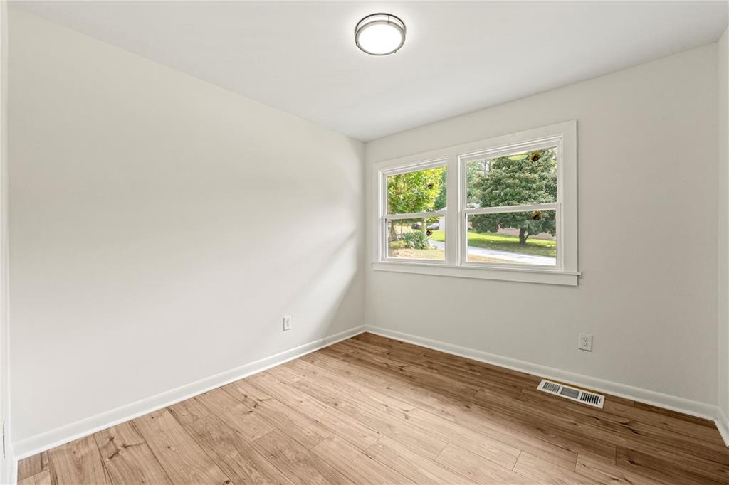 3981 Rutgers Drive Southwest Atlanta, GA 30331 - Photo 7 of 13 an empty room with a window