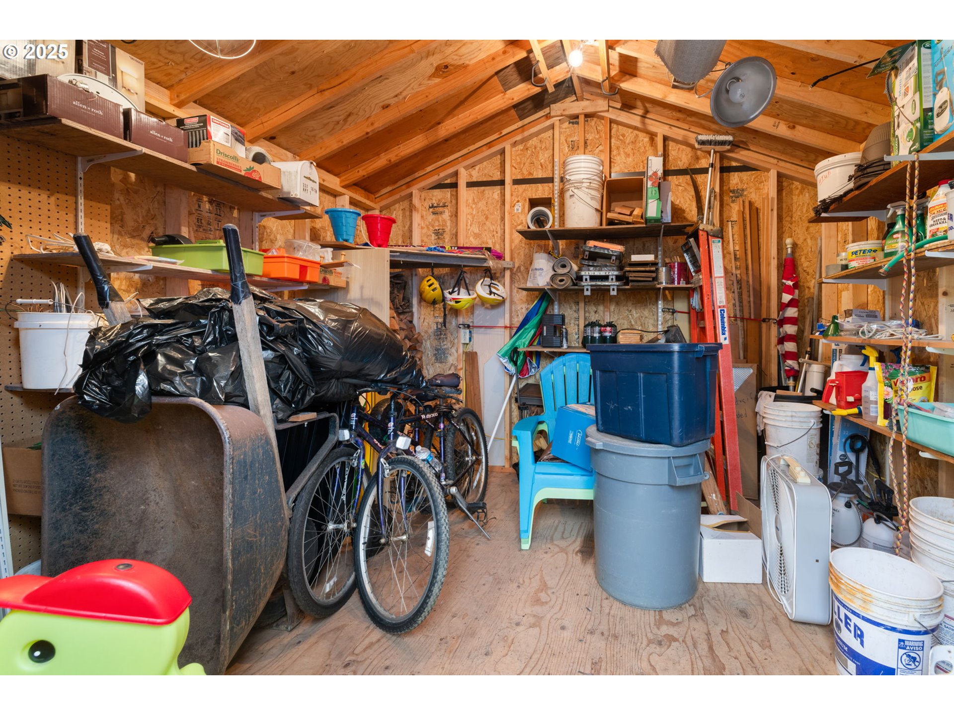337 16th Avenue Seaside, OR 97138 - Photo 24 of 38 a view of a storage room with furniture