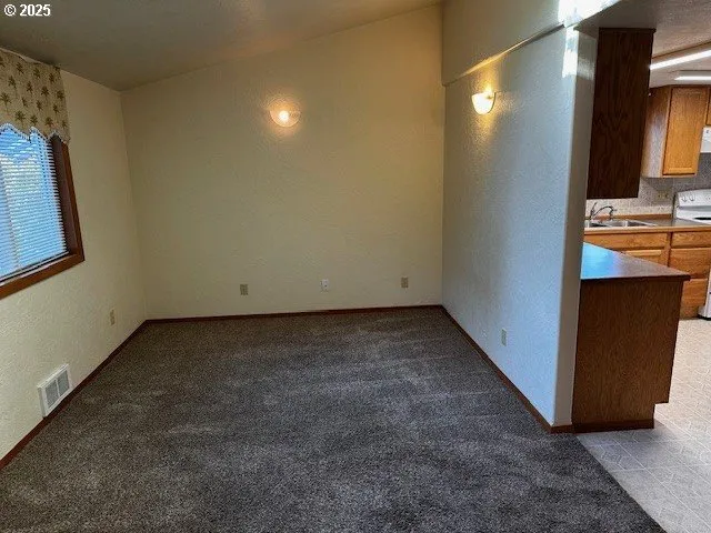 a view of a window in an empty room