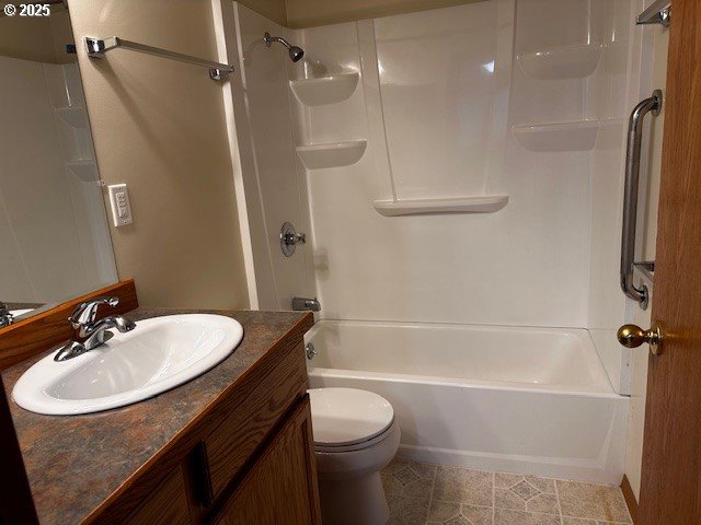 337 16th Avenue Seaside, OR 97138 - Photo 37 of 38 a bathroom with a sink a toilet and shower