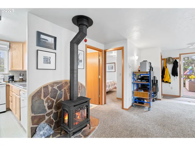 a view of a dining room with furniture and a table