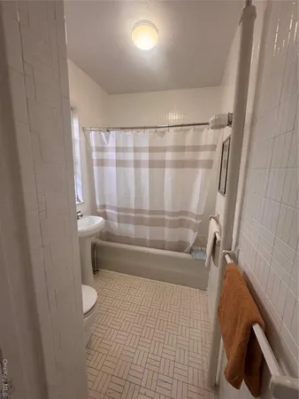 a bathroom with a sink and a shower