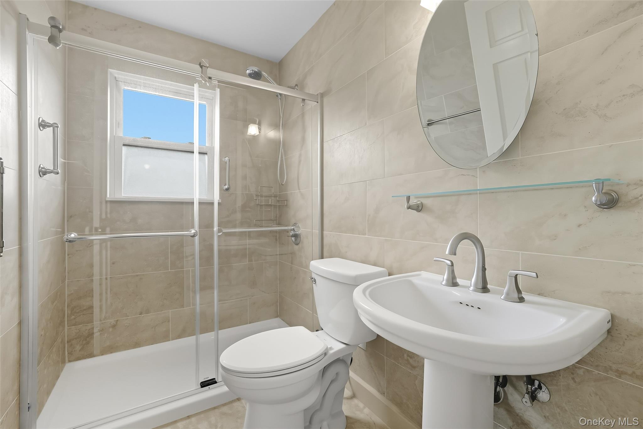 15 Chestnut Street, Unit A4 Rye, NY 10580 - Photo 11 of 14 a bathroom with a sink toilet and shower