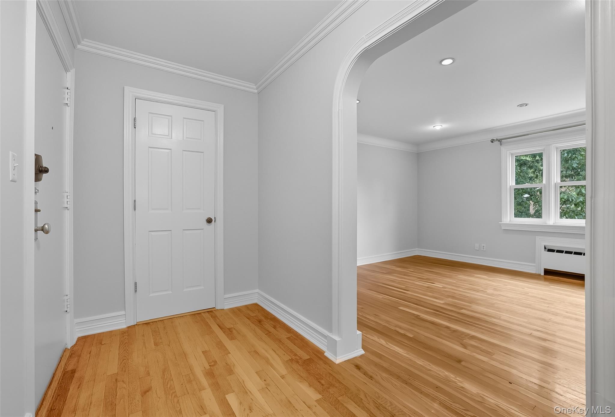 15 Chestnut Street, Unit A4 Rye, NY 10580 - Photo 2 of 14 a view of empty room with wooden floor and fan