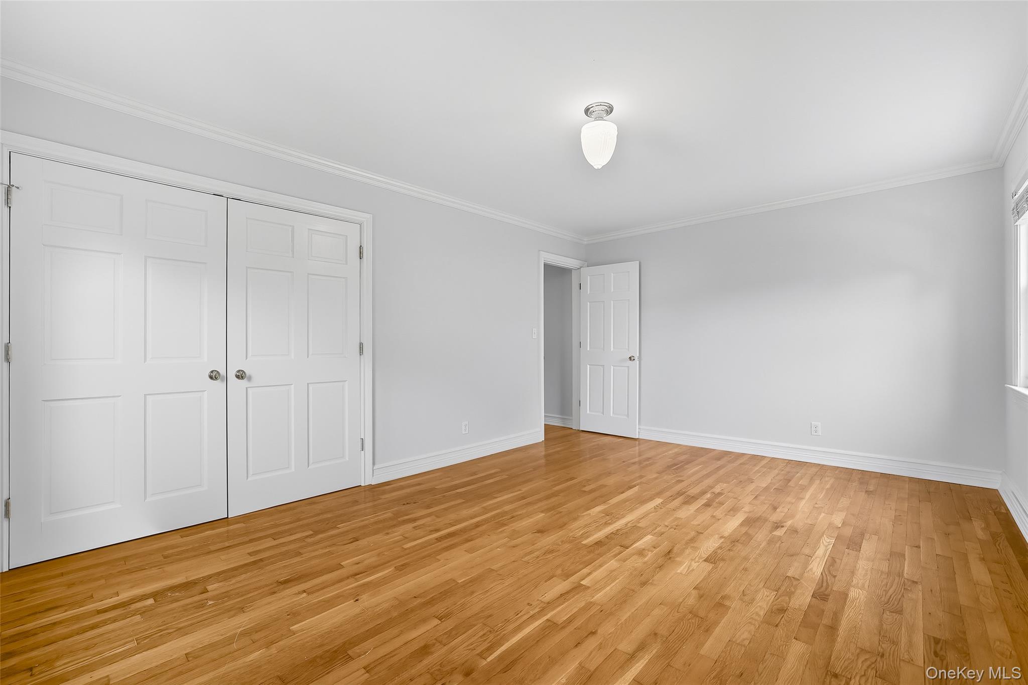 15 Chestnut Street, Unit A4 Rye, NY 10580 - Photo 10 of 14 a view of empty room with wooden floor
