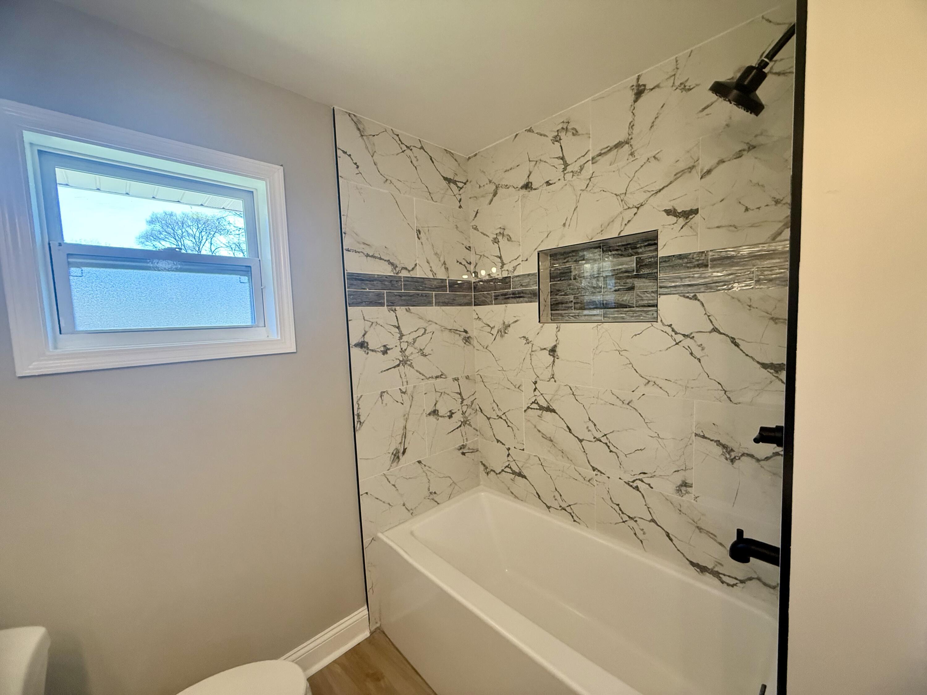 415 North Grand Boulevard Gary, IN 46403 - Photo 24 of 45 a bathroom with a shower