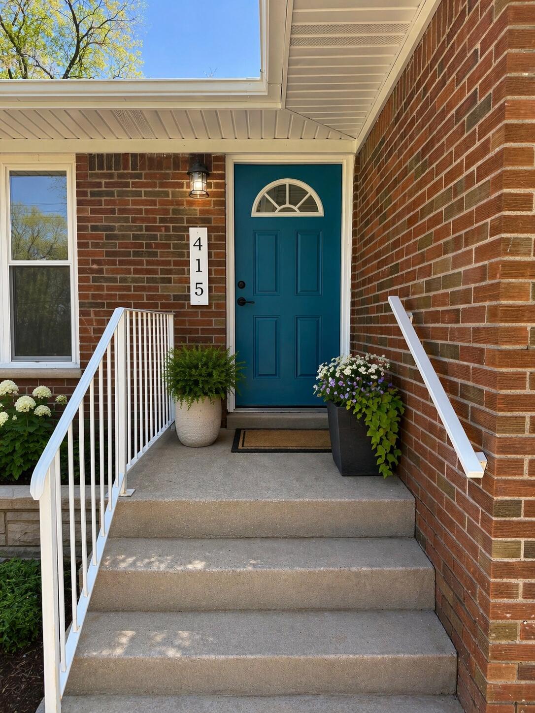 415 North Grand Boulevard Gary, IN 46403 - Photo 3 of 45 a view of a house with potted plants