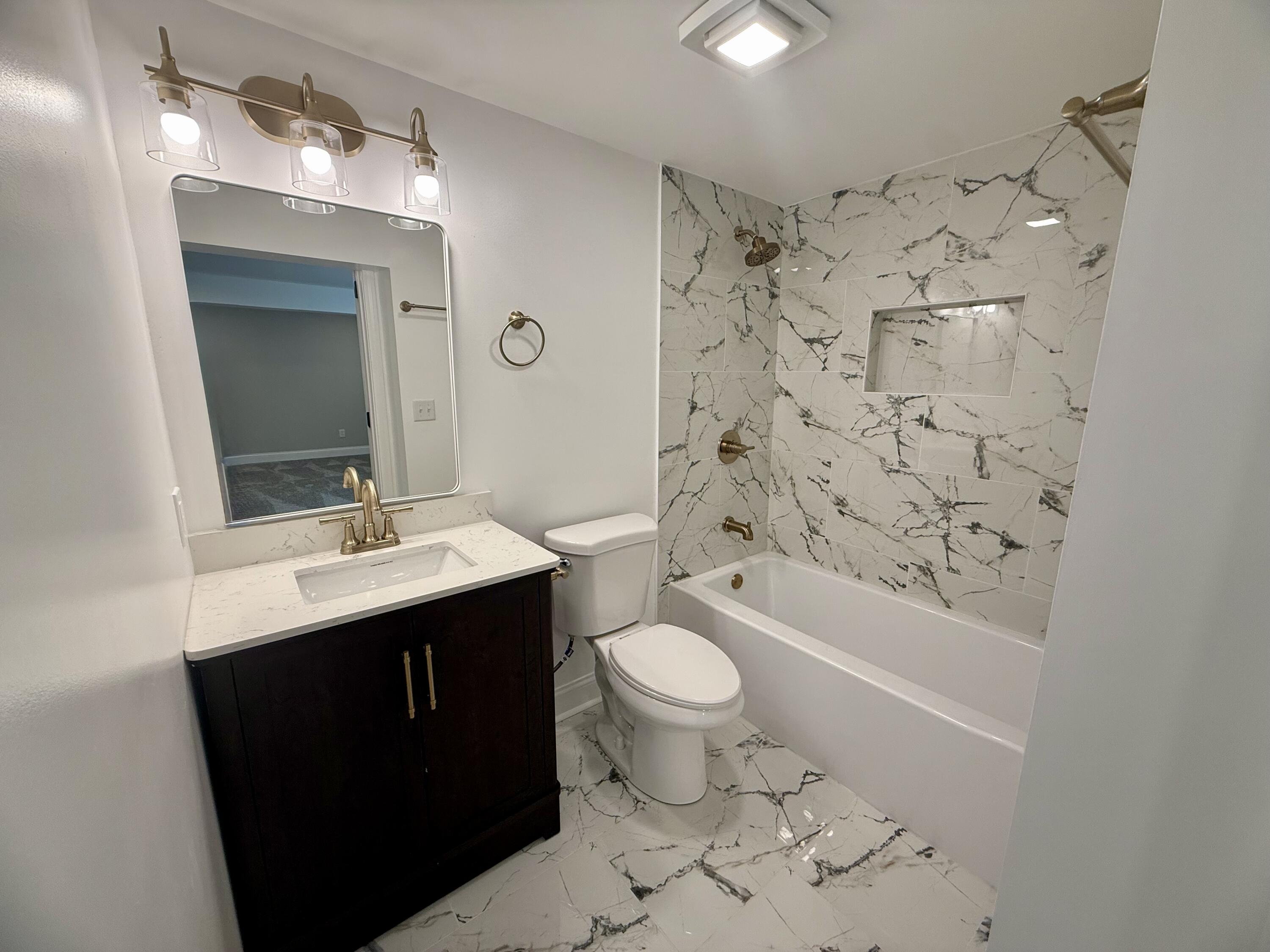 415 North Grand Boulevard Gary, IN 46403 - Photo 34 of 45 a bathroom with a sink toilet tub and shower