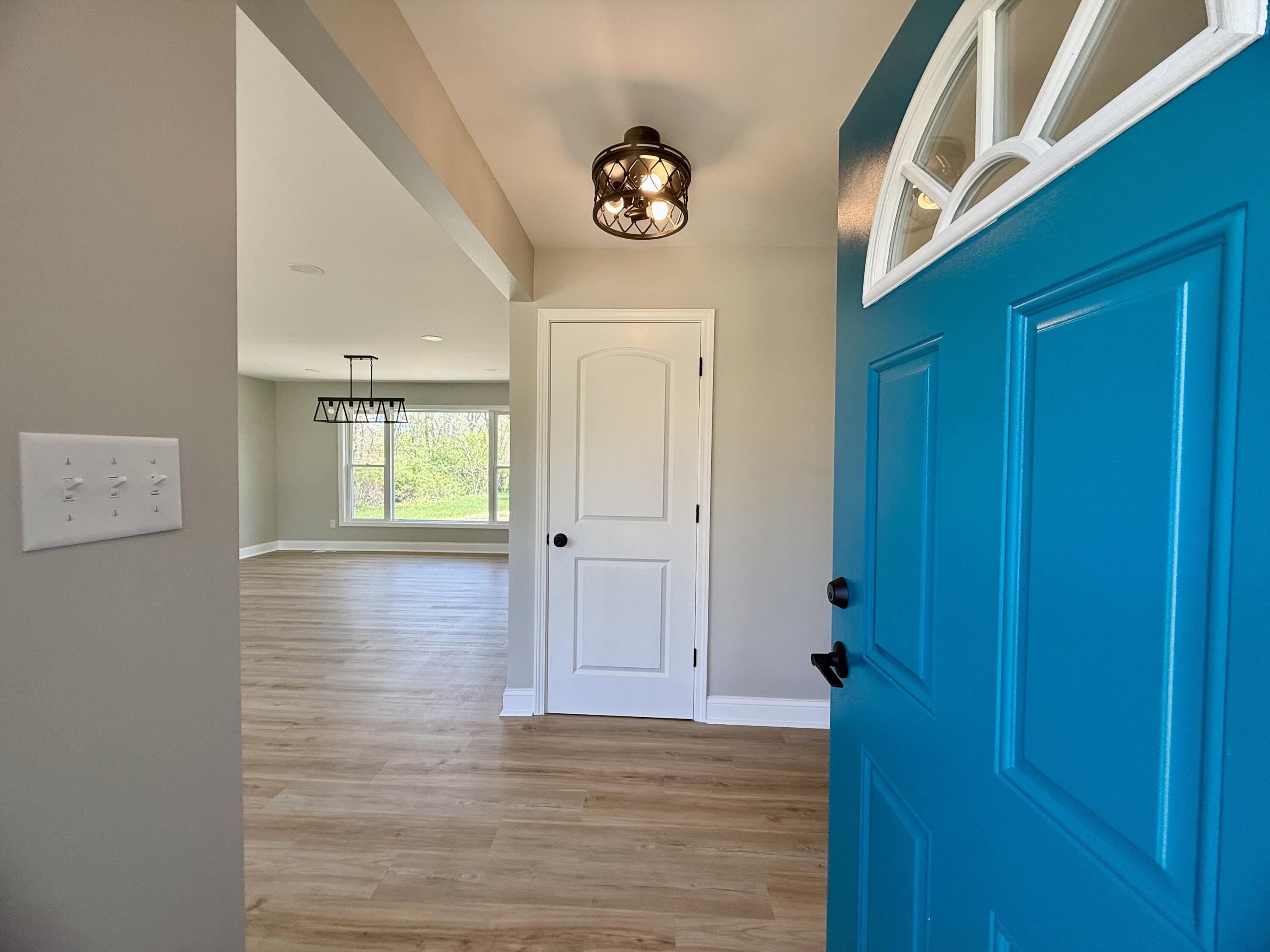 415 North Grand Boulevard Gary, IN 46403 - Photo 8 of 45 a view of an entryway with a wooden floor