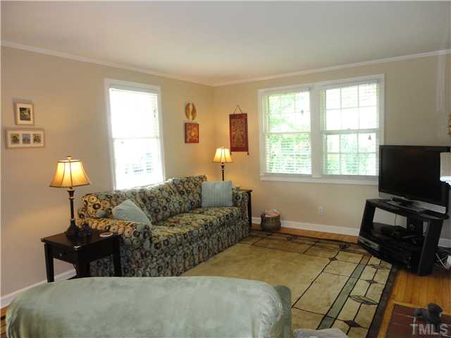 1206 Clifton Street Raleigh, NC 27604 - Photo 5 of 25 a bedroom with a bed and a window