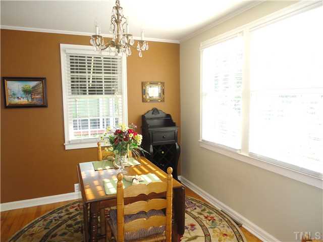 1206 Clifton Street Raleigh, NC 27604 - Photo 9 of 25 a dining room with furniture and window