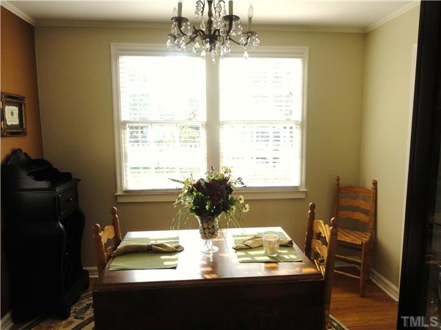1206 Clifton Street Raleigh, NC 27604 - Photo 10 of 25 a view of a dining room with furniture and window