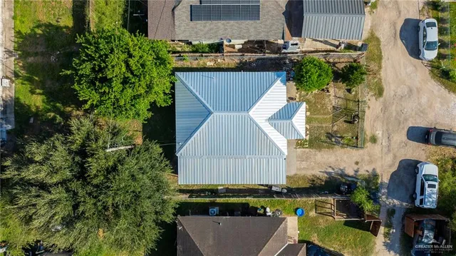 a aerial view of a table and chairs in patio