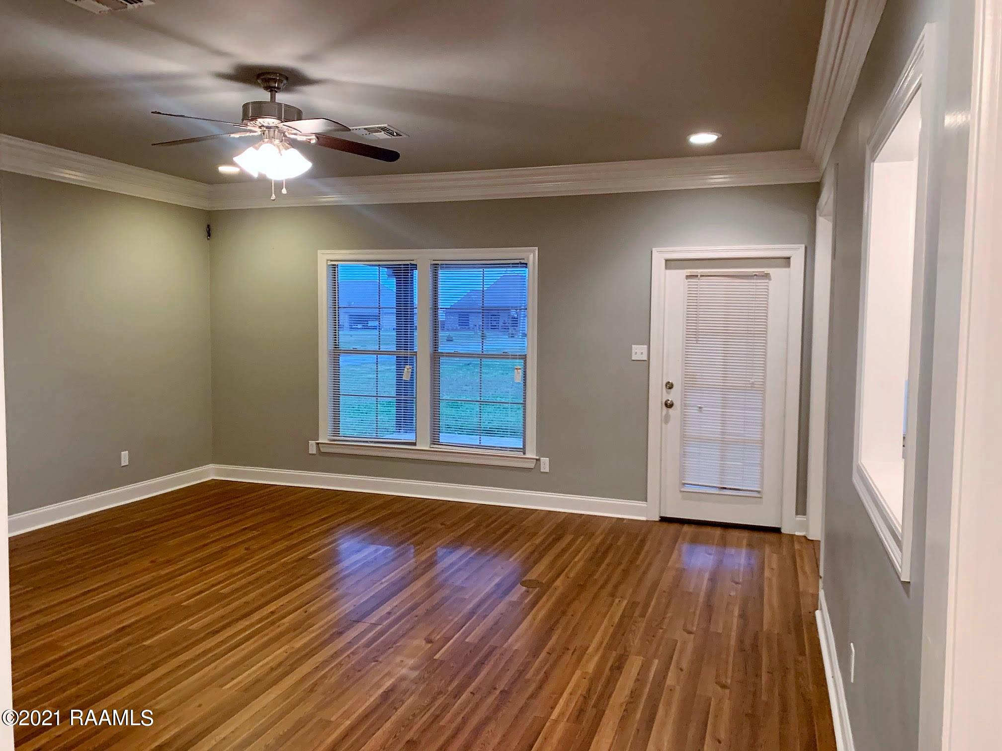 1231 Delcambre Road Breaux Bridge, LA 70517 - Photo 14 of 48 Living opens to Back Patio